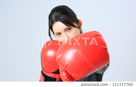 Businesswoman boxing image 121157760