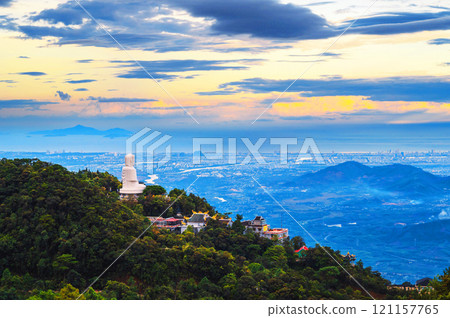 Top view of Da Nang city and Buddha statue from mountain in Ba Na Hills in Vietnam 121157765