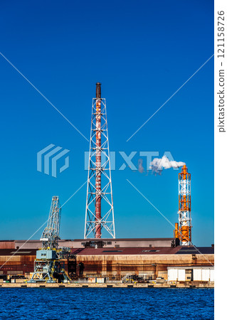 Morning view of Kitakyushu factory (Nippon Steel Kyushu Steel Works) near Matsuyama sightseeing ferry terminal [Kitakyushu City, Fukuoka Prefecture] 121158726