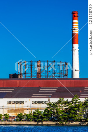 Morning view of Kitakyushu factory (Nippon Steel Kyushu Steel Works) near Matsuyama sightseeing ferry terminal [Kitakyushu City, Fukuoka Prefecture] 121158729