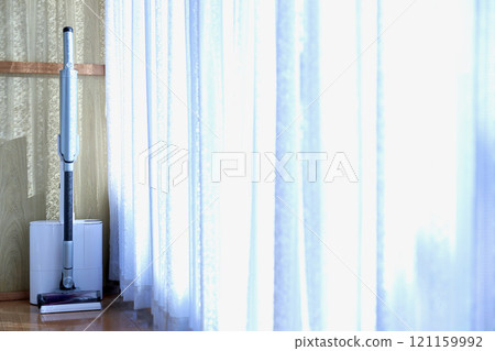 A room with a vacuum cleaner A room with a vacuum cleaner 121159992