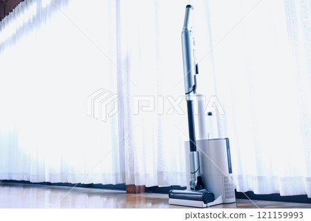 A room with a vacuum cleaner A room with a vacuum cleaner 121159993
