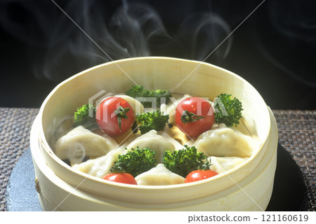 Steamed dumplings in a steamer 121160619