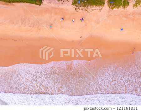 Amazing Top view colorful pink sand beach landscape background,Summer sea waves crashing on sandy shore seascape background,High angle view ocean nature beach background Amazing Top view colorful pink sand beach landscape background,Summer sea waves crashing on sandy shore seascape background,High angle view ocean nature beach background 121161811