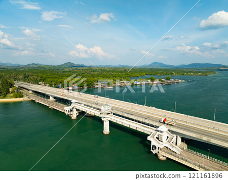 Aerial view of Sarasin bridge road transportation background concept The bridge is a between Phang Nga and Phuket island Thailand The bridge is the most important in making business and transportation Aerial view of Sarasin bridge road transportation background concept The bridge is a between Phang Nga and Phuket island Thailand The bridge is the most important in making business and transportation 121161896