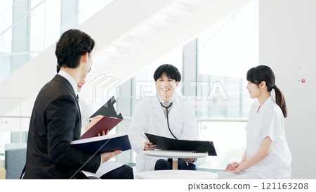 Medical personnel having a meeting Medical personnel having a meeting 121163208