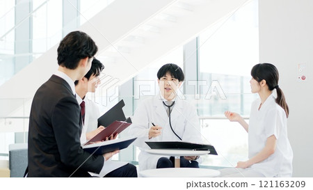 Medical personnel having a meeting Medical personnel having a meeting 121163209