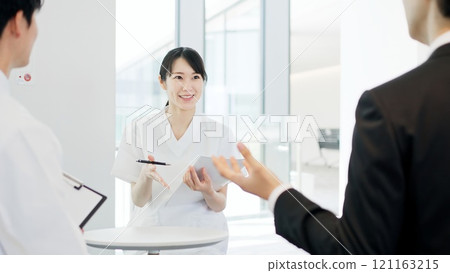 Medical personnel having a meeting Medical personnel having a meeting 121163215