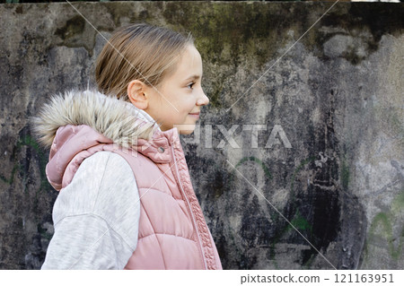 Positive child smiling, outdoors portrait. Happiness and childhood concept Positive child smiling, outdoors portrait. Happiness and childhood concept 121163951