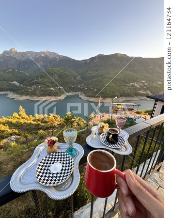 Enjoy a Scenic Coffee Break while taking in Breathtaking Views for a perfect experience 121164734