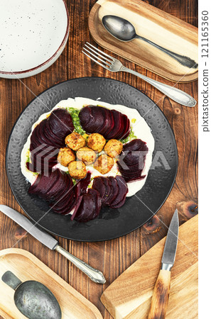 Plate of falafel balls with vegetables. Plate of falafel balls with vegetables. 121165360