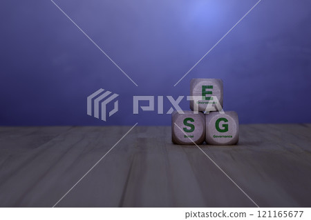 ESG, Renewable energy concept. Icon on wood on green background. ESG icon and Sustainable and renewable green energy icon on wood. Environmental protection. Net zero emissions. Carbon credits. ESG, Renewable energy concept. Icon on wood on green background. ESG icon and Sustainable and renewable green energy icon on wood. Environmental protection. Net zero emissions. Carbon credits. 121165677