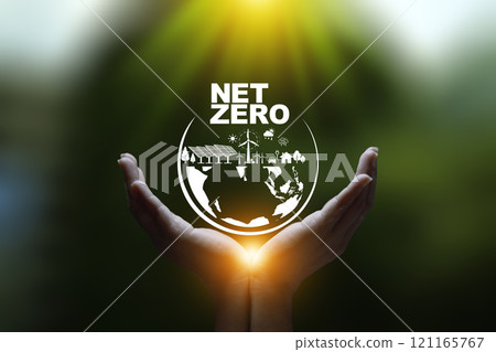 Net zero, carbon neutrality concept. Net zero icon at on hand green blur background. Green Energy Renewable Sustainable ( ESG ). Net zero emission Idea innovative. carbon neutrality in 2050. Net zero, carbon neutrality concept. Net zero icon at on hand green blur background. Green Energy Renewable Sustainable ( ESG ). Net zero emission Idea innovative. carbon neutrality in 2050. 121165767