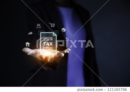 Tax increase concept. tax icon in hand. increasing taxes, Pay online income tax. income tax system icon around. futuristic virtual screen interface technology. 121165786