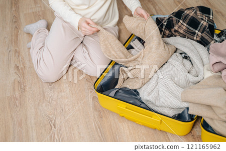 Hand, woman and suitcase for travel, adventure and vacation before leaving for winter holidays 121165962