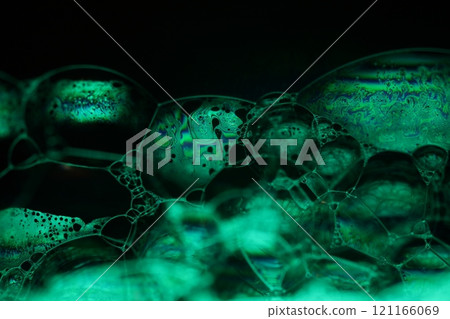 Green liquid phenomenal minimalistic structure, cold green liquid flow on the dark background, colourful abstract, surrealistic art, line of light Green liquid phenomenal minimalistic structure, cold green liquid flow on the dark background, colourful abstract, surrealistic art, line of light 121166069