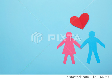 Paper family and heart on blue background. Love and family concept 121166954