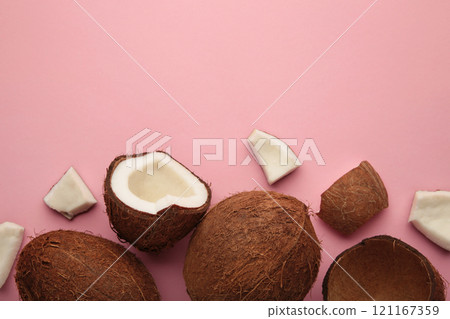 Fresh coconut on pink background. Healthy cooking. 121167359