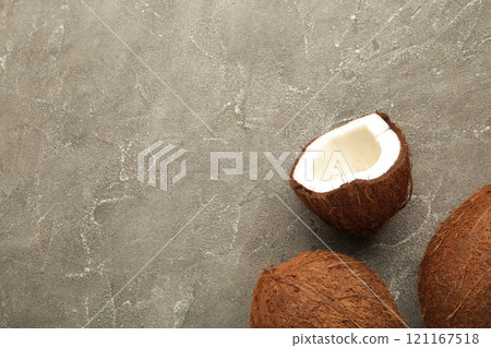 Fresh coconut on grey background. Healthy cooking. 121167518