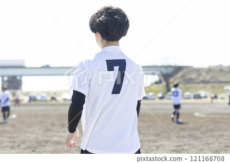 Elementary school team playing soccer 121168708