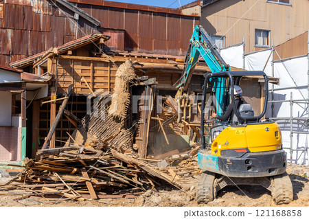 Demolition of an old wooden house Demolition of an old wooden house 121168858