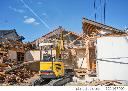 Demolition of an old wooden house 121168901