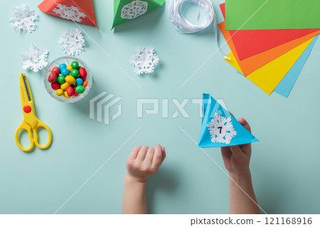 Advent calendar made of colored paper. Step-by-step instructions for making Christmas crafts. Diy for children. flat lay 121168916