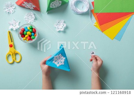 Advent calendar made of colored paper. Step-by-step instructions for making Christmas crafts. Diy for children. flat lay 121168918