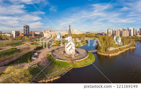 Aerial top View to St. George the Victorious Georgievskaya, Sergius Of Radonezh and Church Nativity of Christ and Srednerogatsky pond. Pulkovsky park. Saint Petersburg. Russia. Europe 121169149