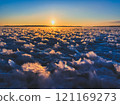 Frosty air and frozen lake surface in a beautiful sunset landscape. Beautiful ice shapes and sunlight. Photo from Sotkamo, Finland. 121169273