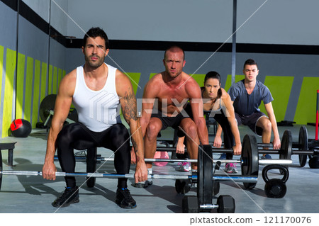 gym group with weight lifting bar crossfit workout gym group with weight lifting bar crossfit workout 121170076