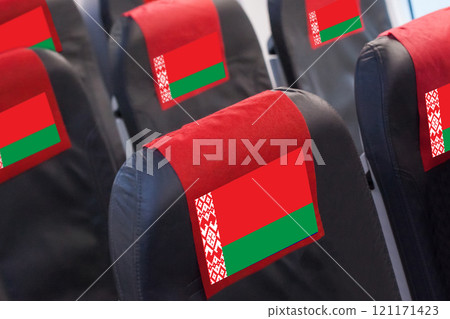 Flag on Empty seat in plane. Travel, flight and transportration in Belarus concept 121171423