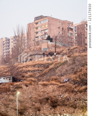 residential building above ravine in pink twilight residential building above ravine in pink twilight 121173910
