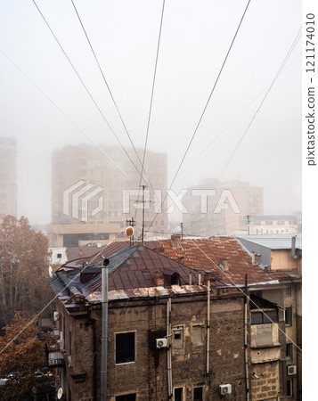 apartment houses under smoke, smog and fog apartment houses under smoke, smog and fog 121174010