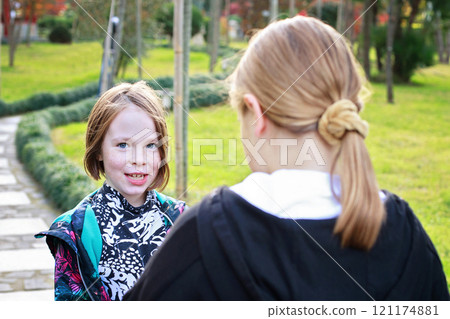 Happy young little girls playing in the park outdoors. Best friend kids 121174881