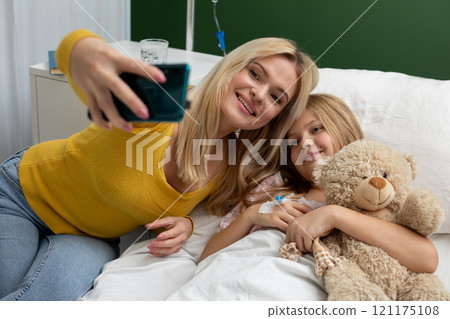 Experiencing Joyful Moments within a Hospital Room Featuring a Loving Mother and Her Child Experiencing Joyful Moments within a Hospital Room Featuring a Loving Mother and Her Child 121175108