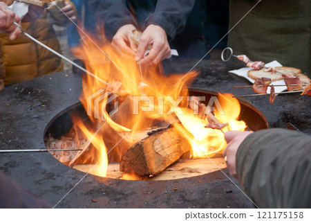 Family at outdoor barbecue party 121175158