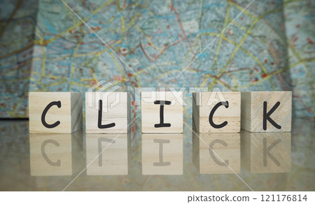 Click is written in black letters on a wooden block Click is written in black letters on a wooden block 121176814