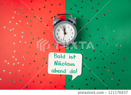 Clock is on a green background with a red background 121176837