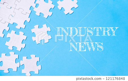 Jigsaw puzzle with the word Industry News written on it Jigsaw puzzle with the word Industry News written on it 121176848