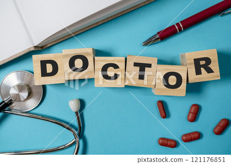wooden blocks spelling out the word doctor 121176851