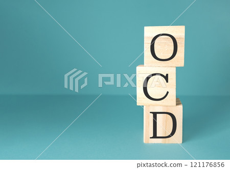 Three wooden blocks stacked on top of each other Three wooden blocks stacked on top of each other 121176856
