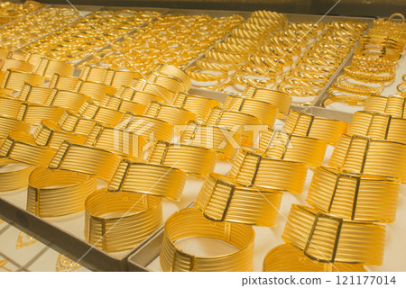 Background with shinny golden rings Background with shinny golden rings 121177014