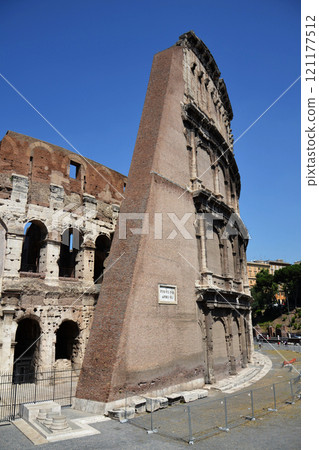 Walls of the Roman Colosseum in Rome, Italy, sunny day, clear blue sky Walls of the Roman Colosseum in Rome, Italy, sunny day, clear blue sky 121177512