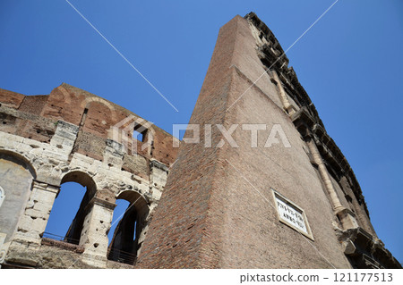 Walls of the Roman Colosseum in Rome, Italy, sunny day, clear blue sky Walls of the Roman Colosseum in Rome, Italy, sunny day, clear blue sky 121177513