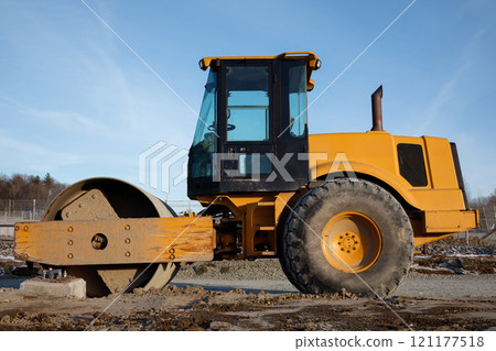 Road Roller Compactor at Construction Site 121177518