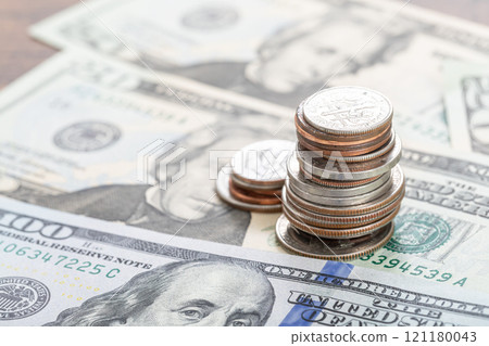 US dollar banknotes and coins US dollar banknotes and coins 121180043