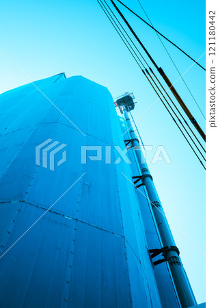 Apartment buildings under construction in the city and tower cranes Apartment buildings under construction in the city and tower cranes 121180442