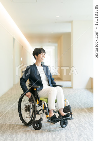 Female wheelchair user in suit Female wheelchair user in suit 121181588