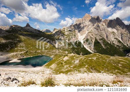 Natural lakes Bodenseen surrounded by rocky mountains in Sexten Dolomites 121181690